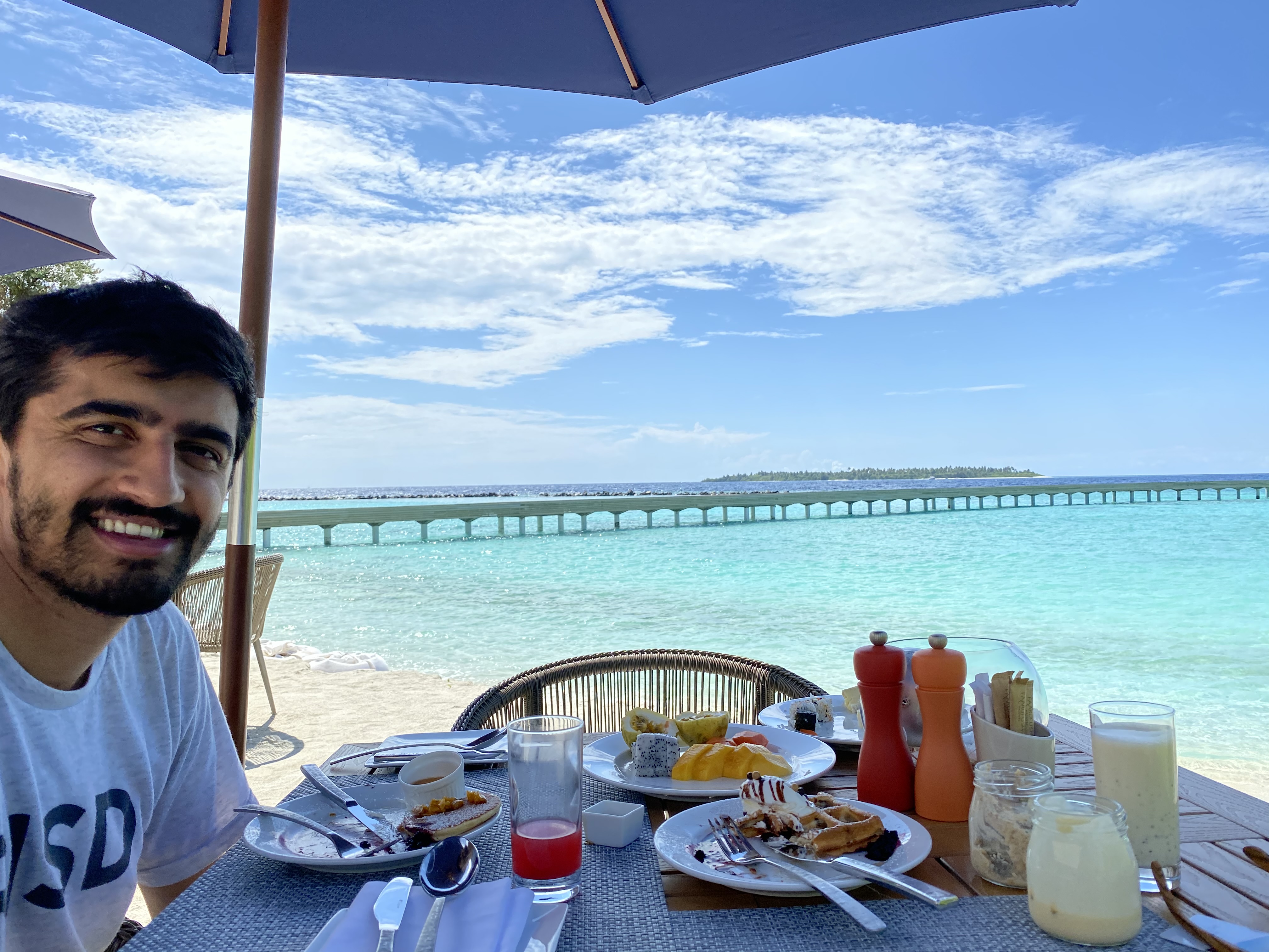 Oceanfront breakfast spread at Faarufushi Maldives