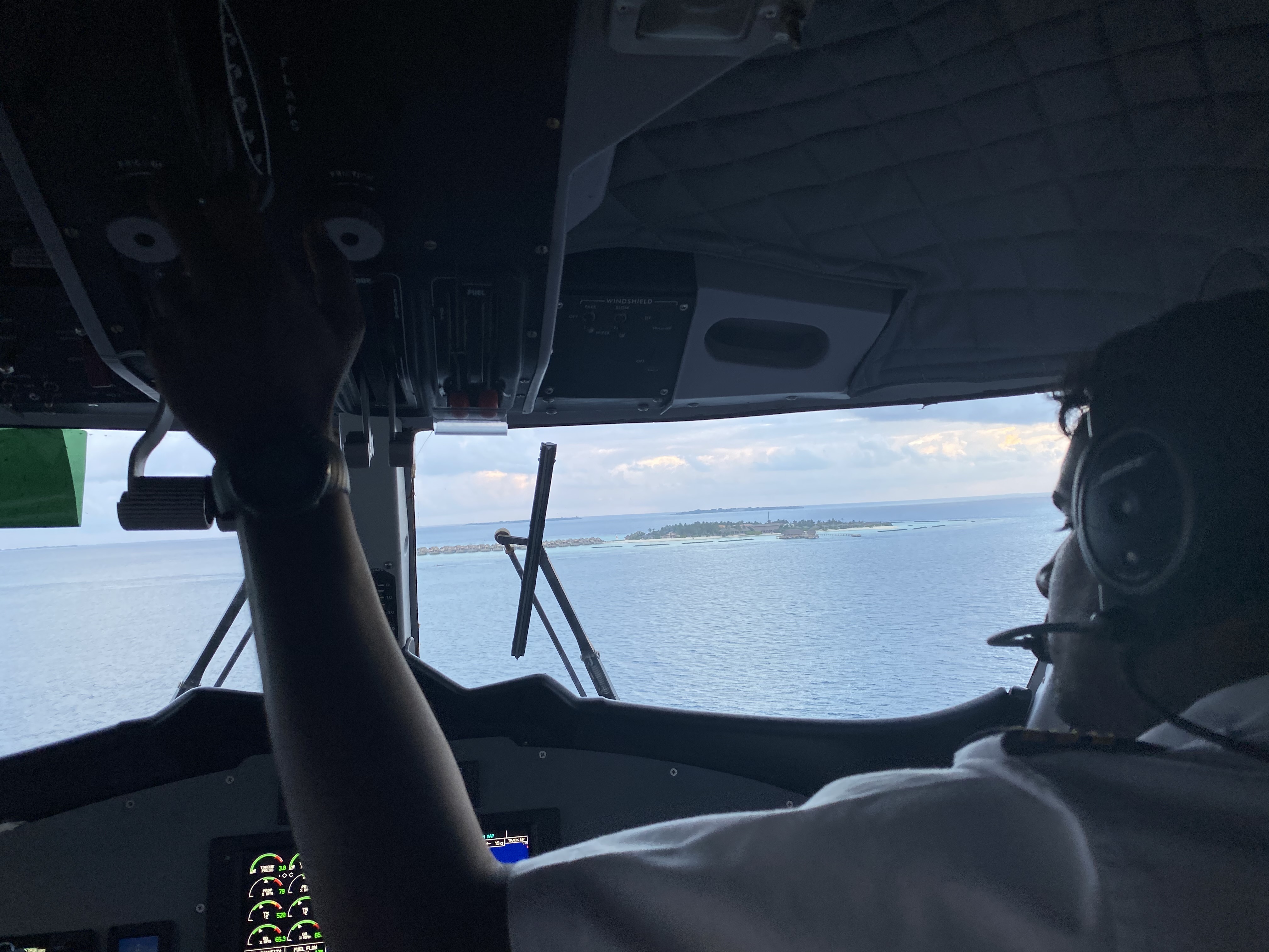View from the seaplane cockpit approaching Faarufushi