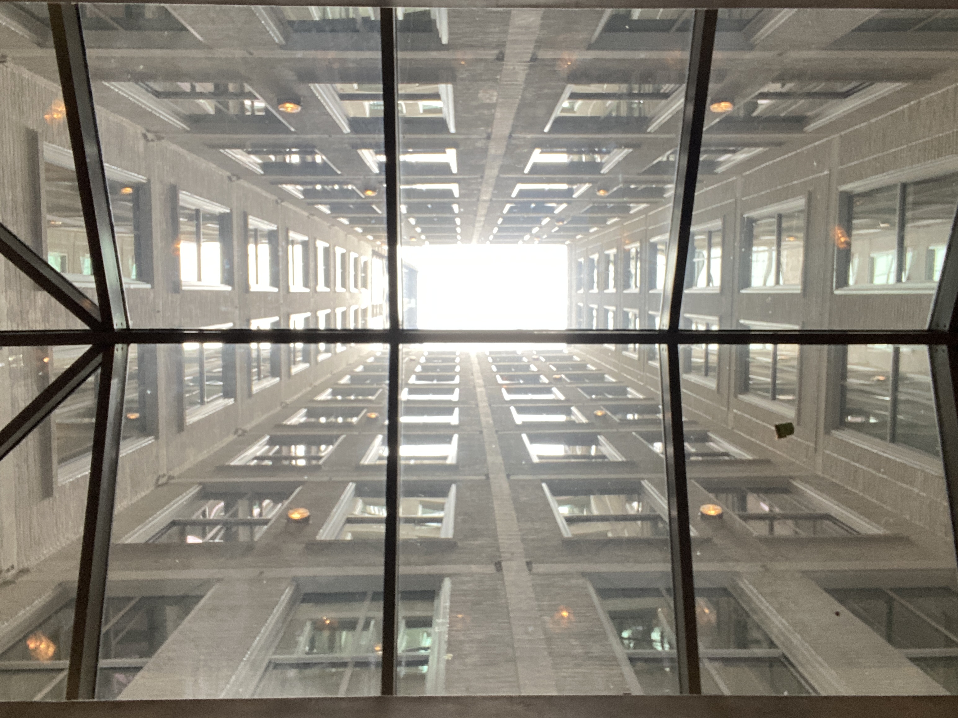 Looking up through The Beekman's nine-story glass and steel atrium